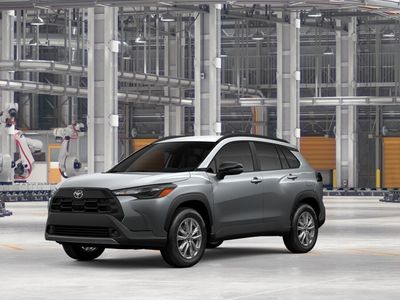 2026 Toyota Corolla Cross LE in Sonic Silver — front three-quarter view