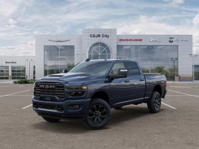 2026 RAM Ram 2500 RAM 2500 LARAMIE CREW CAB 4X4 6'4' BOX in Forged Blue Metallic Exterior Paint — front three-quarter view
