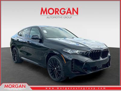 2027 BMW X6 xDrive40i in Black Sapphire Metallic — front three-quarter view
