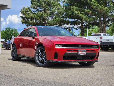 2026 Dodge Charger CHARGER SCAT PACK PLUS 4-DOOR AWD in Redeye Exterior Paint — front three-quarter view