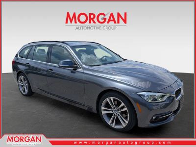 2018 BMW 3 Series 328d xDrive in Mineral Gray Metallic — front three-quarter view