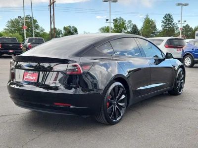 2020 Tesla Model 3 — rear three-quarter view