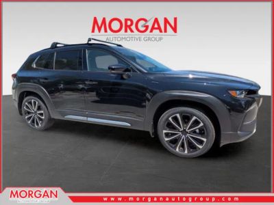 2026 Mazda CX-50 2.5 Turbo Premium Plus in Jet Black Mica — front three-quarter view