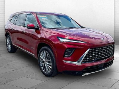 2025 Buick Enclave Avenir in Cherry Red Tintcoat — front three-quarter view