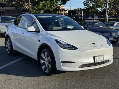 2023 Tesla Model Y — side profile view