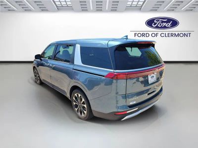2023 Kia Carnival — rear three-quarter view