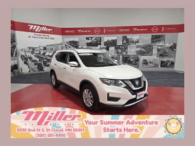 2018 Nissan Rogue SV in Pearl White — front three-quarter view