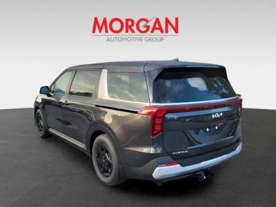 2026 Kia Carnival — rear three-quarter view