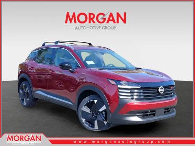 2026 Nissan Kicks SR in Red — front three-quarter view