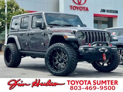 2021 Jeep Wrangler Unlimited Rubicon in Crystal Metallic — front three-quarter view