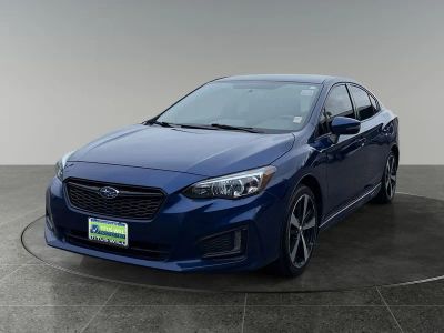 2017 Subaru Impreza — rear three-quarter view
