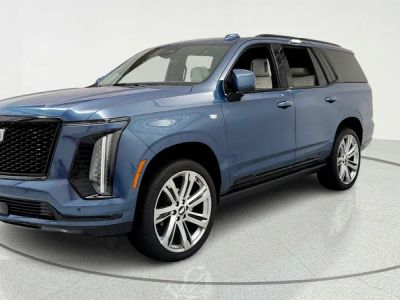 2026 Cadillac Escalade Platinum Sport in Deep Sea Metallic — front three-quarter view
