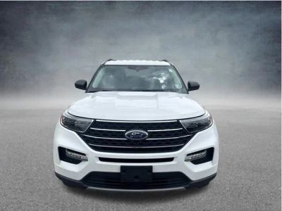 2023 Ford Explorer XLT in White Metallic — front three-quarter view