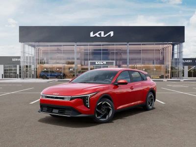 2026 Kia K4 EX in Currant Red — front three-quarter view
