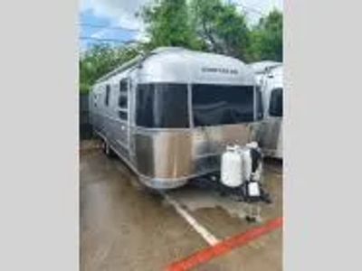 2026 Airstream 27FB Twin — front three-quarter view