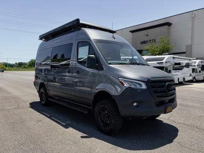 2026 Storyteller Overland DARK MODE — front three-quarter view