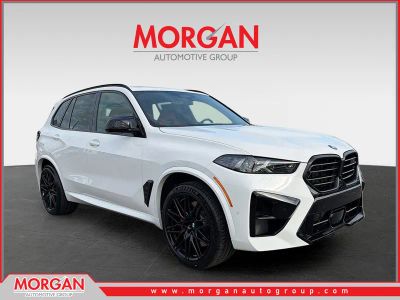 2026 BMW X5 M Competition in Alpine White — front three-quarter view