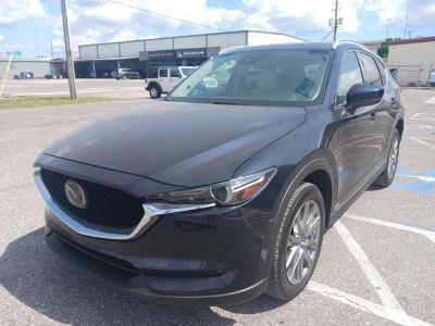 2019 Mazda CX-5 Grand Touring in Blue — front three-quarter view