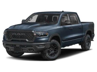 2026 RAM 1500 RAM 1500 REBEL CREW CAB 4X4 5'7' BOX in Forged Blue Metallic Exterior Paint — front three-quarter view