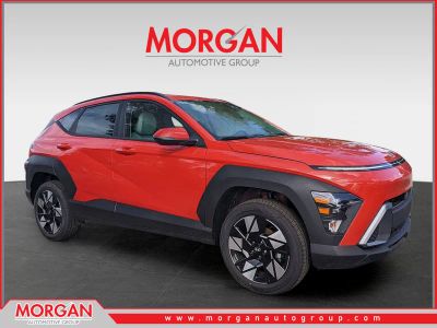 2025 Hyundai KONA SEL Convenience in Soultronic Orange Pearl — front three-quarter view