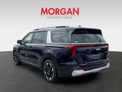 2026 Kia Carnival — rear three-quarter view