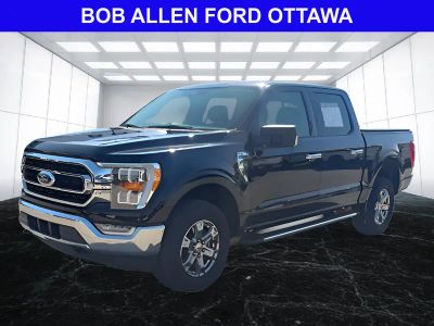 2023 Ford F-150 XLT in Agate Black — front three-quarter view