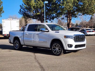 2026 RAM 1500 RAM 1500 TUNGSTEN CREW CAB 4X4 in Ivory White Tri-Coat Pearl-Coat Exterior Paint — front three-quarter view