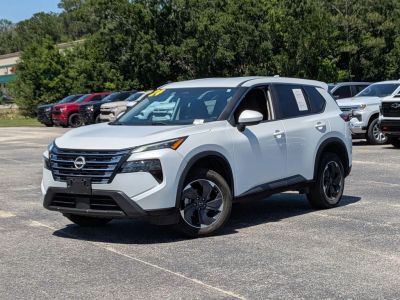 2024 Nissan Rogue SV in White — front three-quarter view