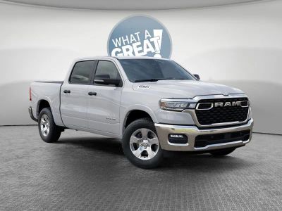 2026 RAM 1500 Big Horn/Lone Star in Bright White Clear-Coat Exterior Paint — front three-quarter view