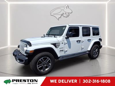 2023 Jeep Wrangler Sahara in Bright White Clearcoat — front three-quarter view