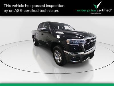 2025 Ram 1500 Big Horn 4x4 Crew Cab 5'7" Box — front three-quarter view