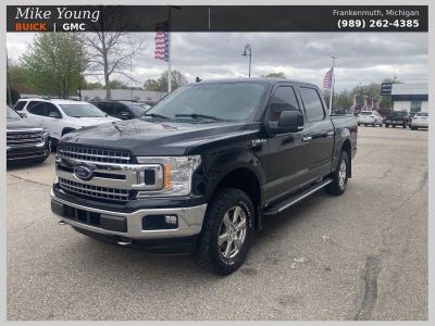 2018 Ford F-150 XLT in Black — front three-quarter view