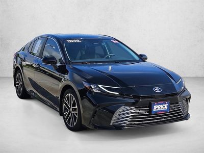 2026 Toyota Camry XLE in Midnight Black Met — front three-quarter view