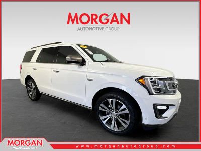2021 Ford Expedition King Ranch in Star White Metallic Tri-Coat — front three-quarter view