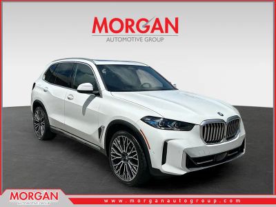2024 BMW X5 sDrive40i in White — front three-quarter view