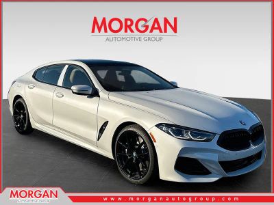2026 BMW 8 Series 840 in White — front three-quarter view
