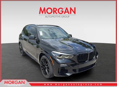 2021 BMW X5 sDrive40i in Black Sapphire Metallic — front three-quarter view
