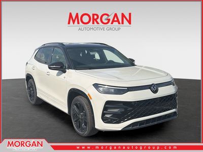 2026 Volkswagen Tiguan SE R-Line Black in Sandstone — front three-quarter view