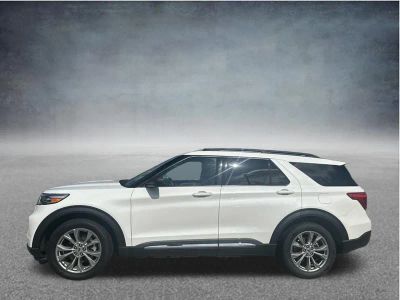 2023 Ford Explorer XLT in White Metallic — front three-quarter view