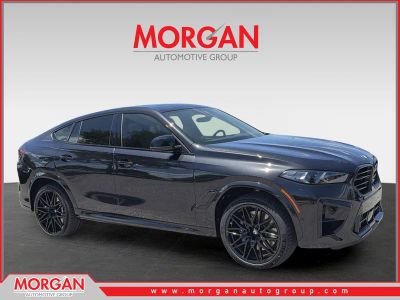 2027 BMW X6 M Competition in Black — front three-quarter view