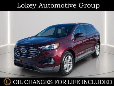 2020 Ford Edge SEL in Burgundy — front three-quarter view