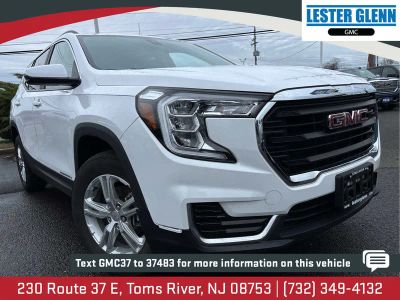 2023 GMC Terrain SLE in Summit White — front three-quarter view