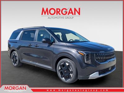 2026 Kia Carnival EX in Panthera Metal — front three-quarter view