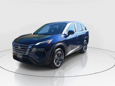2025 Nissan Rogue — rear three-quarter view