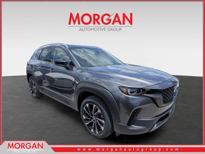 2026 Mazda CX-50 Hybrid Premium Plus in Machine Gray Metallic — front three-quarter view