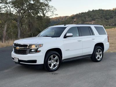 2015 Chevrolet Tahoe in White — front three-quarter view