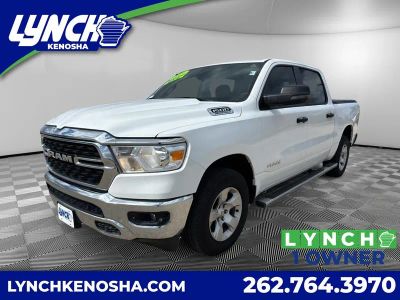 2023 RAM 1500 Big Horn in White — front three-quarter view