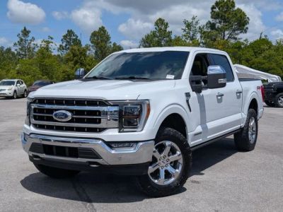 2023 Ford F-150 Lariat in White — front three-quarter view