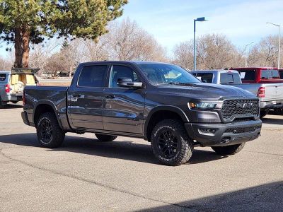 2026 RAM 1500 RAM 1500 REBEL CREW CAB 4X4 5'7' BOX in Granite Crystal Metallic Clear-Coat Exterior Paint — front three-quarter view