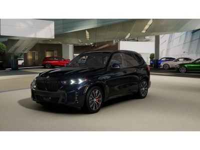 2026 BMW X5 xDrive40i in Carbon Black Metallic — front three-quarter view